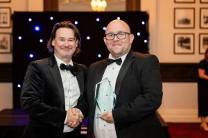 Chris Orme of Fosroc receiving the Project of the Year Award.