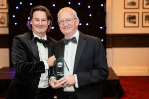 Bill Jones receives his award from Jonathan Thurlbeck