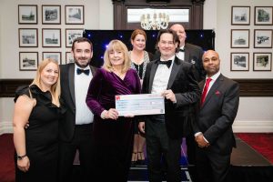 The CRA present a cheque to construction industry charity CRASH